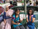 Ritika ans EDantana show off their prizes to their grandmother Kalyani
