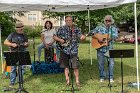 The Harmonators Joe Burns (l), Dianne Iannitelli (rear) and Glen Woodworth (r) offered great harmonies, fine guitar work and hand percussion entertainment on Fun Day