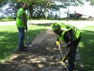 Charles and Mike from Heimlich Construction re-grade the path