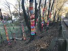 “Ripple”, giant knitted sleeves for bikeway trees near Spy Pond Field by 60 town volunteers, coordinated by Adria Arch, Arlington Public Art.  What, your trees don’t have jumpers?