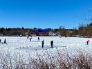 Variety of winter activities on frozen Spy Pond