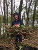 This youthful volunteer collected invasive plants to put in bags.