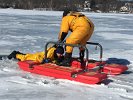 Andrew Flynn performed rescue techniques on an ice rescue sled in this practice session.
