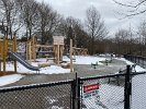 In the snowy stillness the playground equipment awaits the return of Spring when visitors might have imaginary races on the rocking horses and enjoy climbing activities.