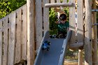 The car careened down the slide first as he tested it out.