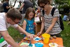 Charlotte Schneider concentrated on her leaf printing while her snow cone waited for the next slurp.