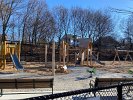 The pathway through the playground is nearing completion.  Soon an eager visitors will arrive to ride the green ponies, rest on the logs, and climb up and slide down the slides.