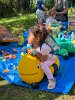 Latoya and Simone Steinbrink enjoyed a special play area filled with toys and ride-on animals, making it a fun and safe spot just for them.