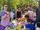 The children let their creativity shine as they crafted enchanting fairy houses with vibrant materials and imaginative designs as Leah Cirker-Stark, the Fairy Lady, offered her encouraging guidance.