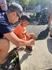 Alan and Caleb Yang worked together building a bark boat, turning nature into a hands-on craft activity.