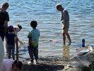 Brad Barber watched as families gathered at the water’s edge to test their handmade bark boats seeing if they could stand the might of Spy Pond.